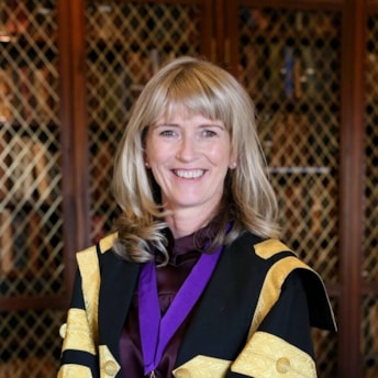 Headshot of Professor Mary Horgan in her presidential gown. Prof Horgan is President of RCPI